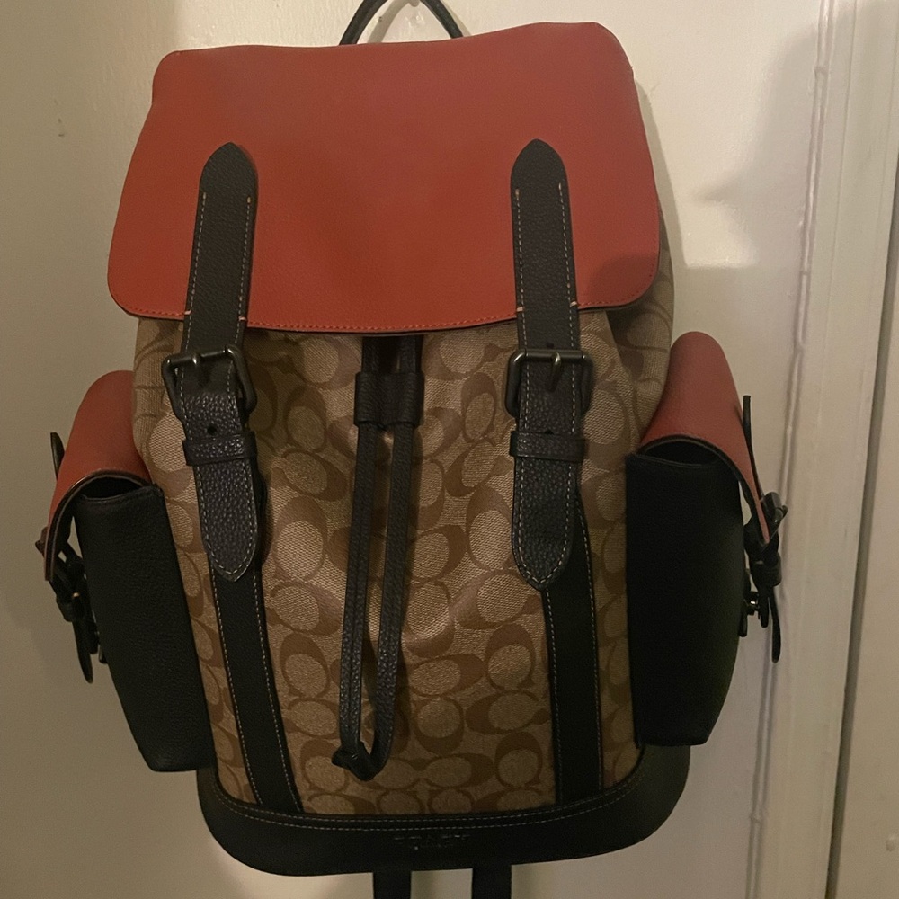 Coach back pack new never used selling with card holder